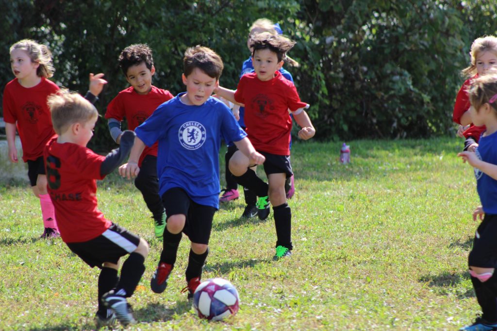 kids playing football